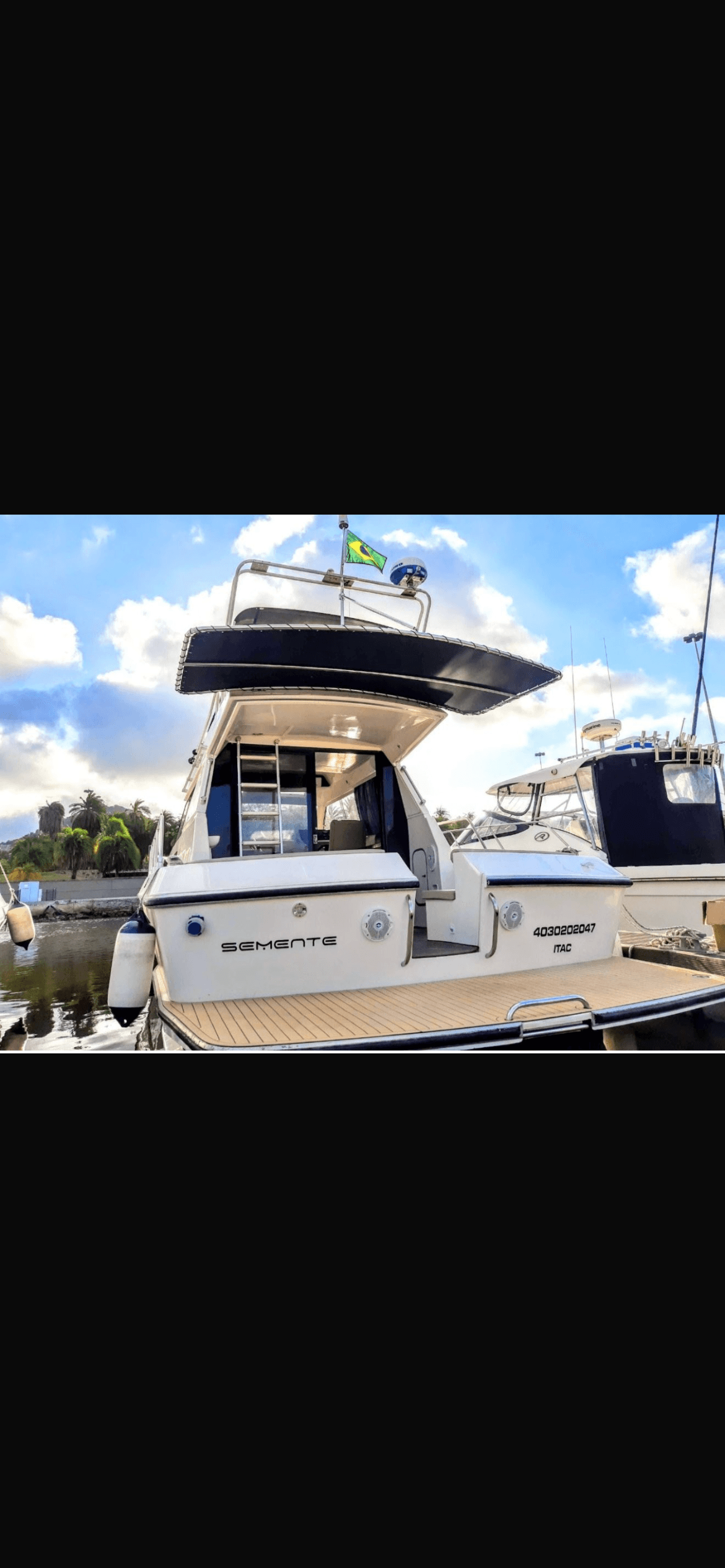 Oceanic 36 yacht exterior view with white hull and blue accents