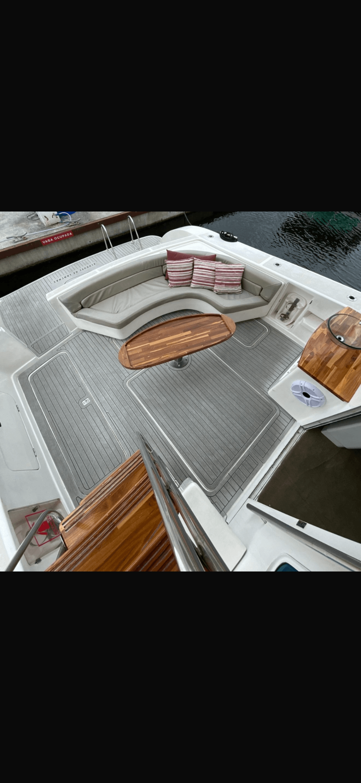 Intermares 47 rear deck with seating area and wooden tables