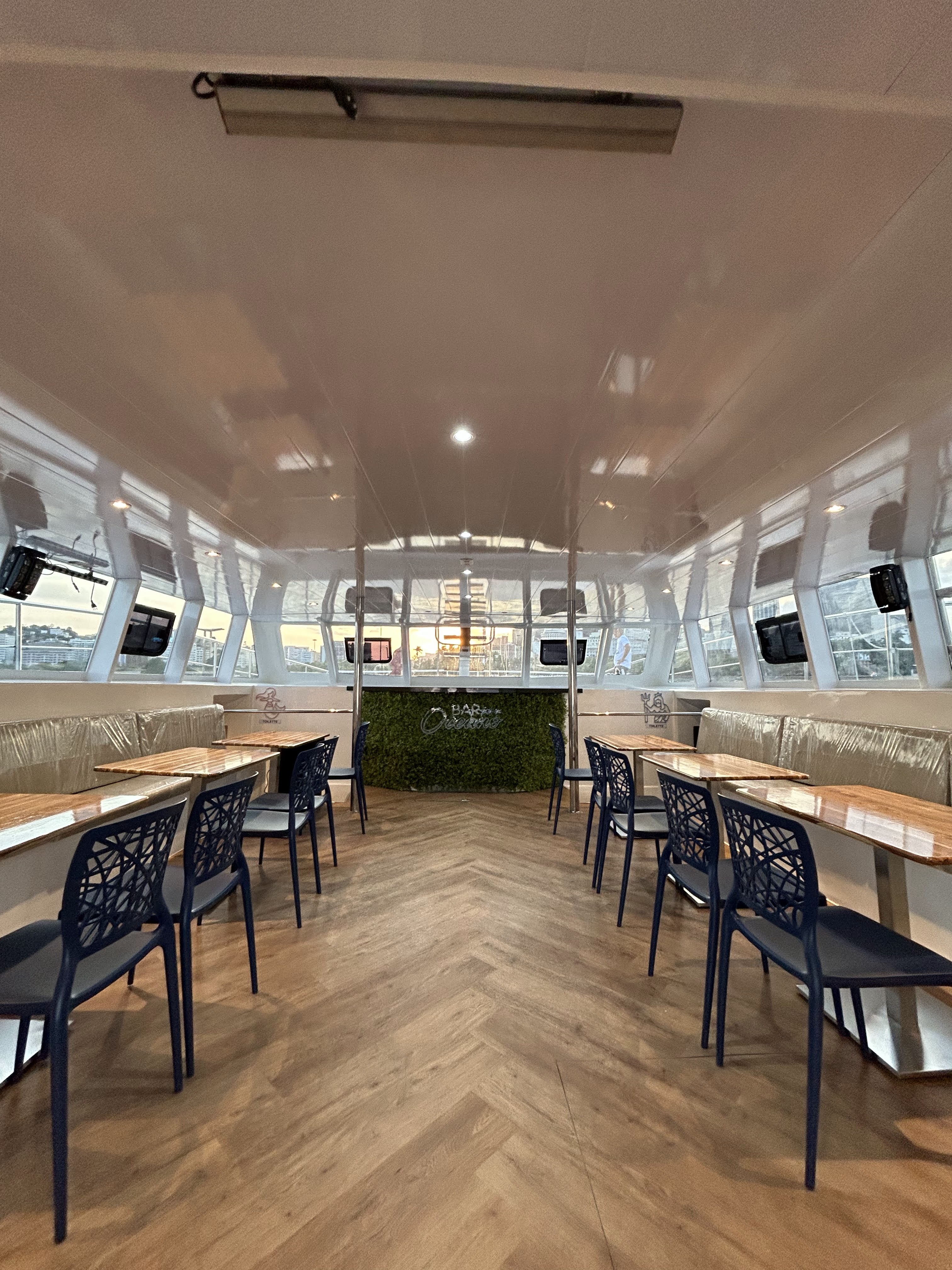 Oceano interior dining area with tables and chairs