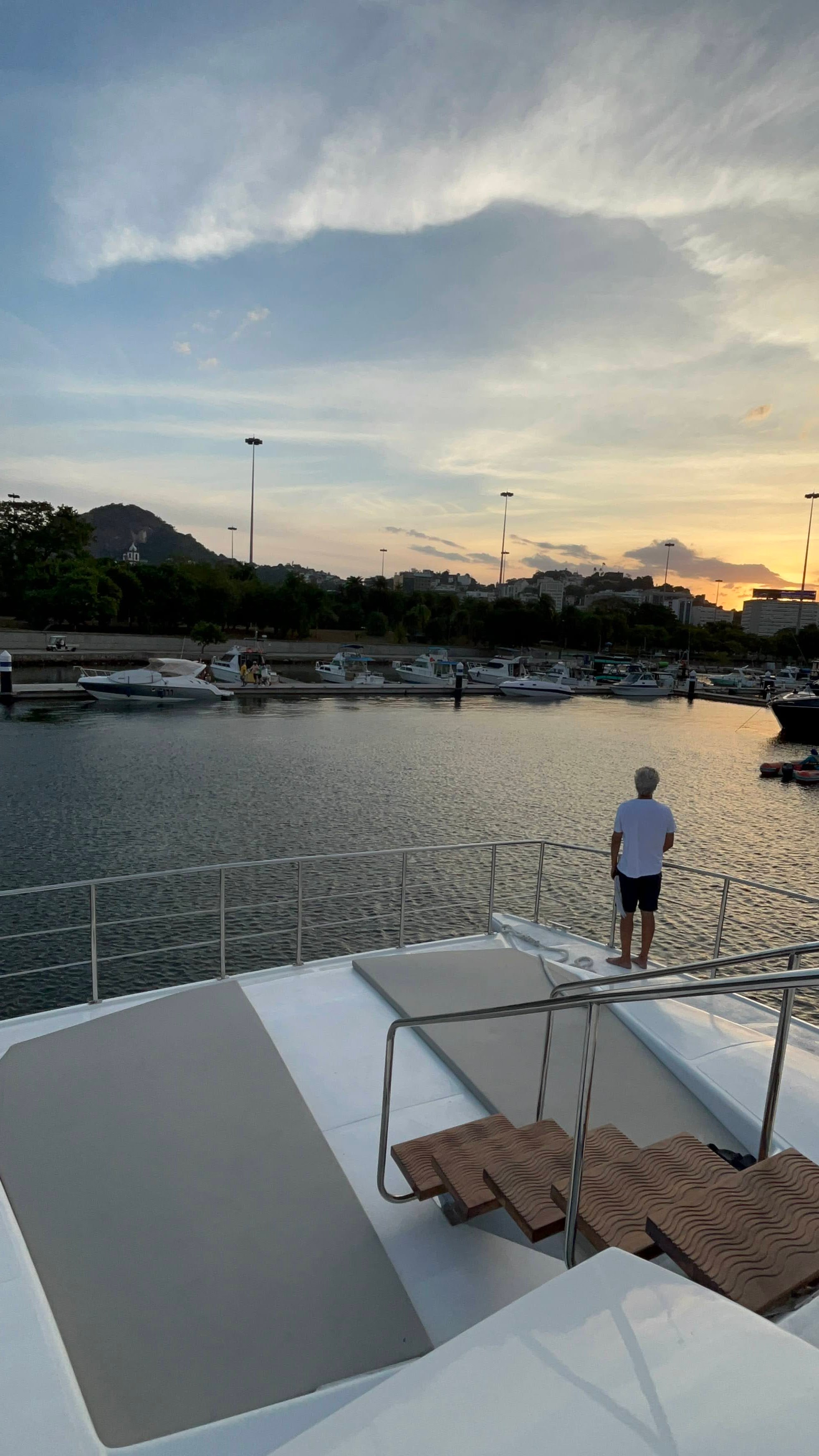 View from Oceano boat at sunset with person on deck